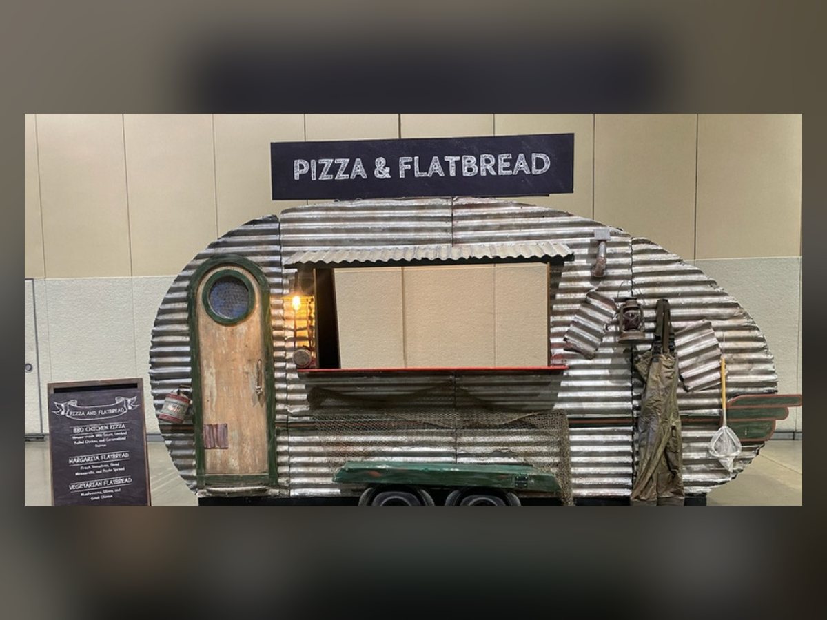 Catfish Charlie's corrugated food truck facade with chalk menu board