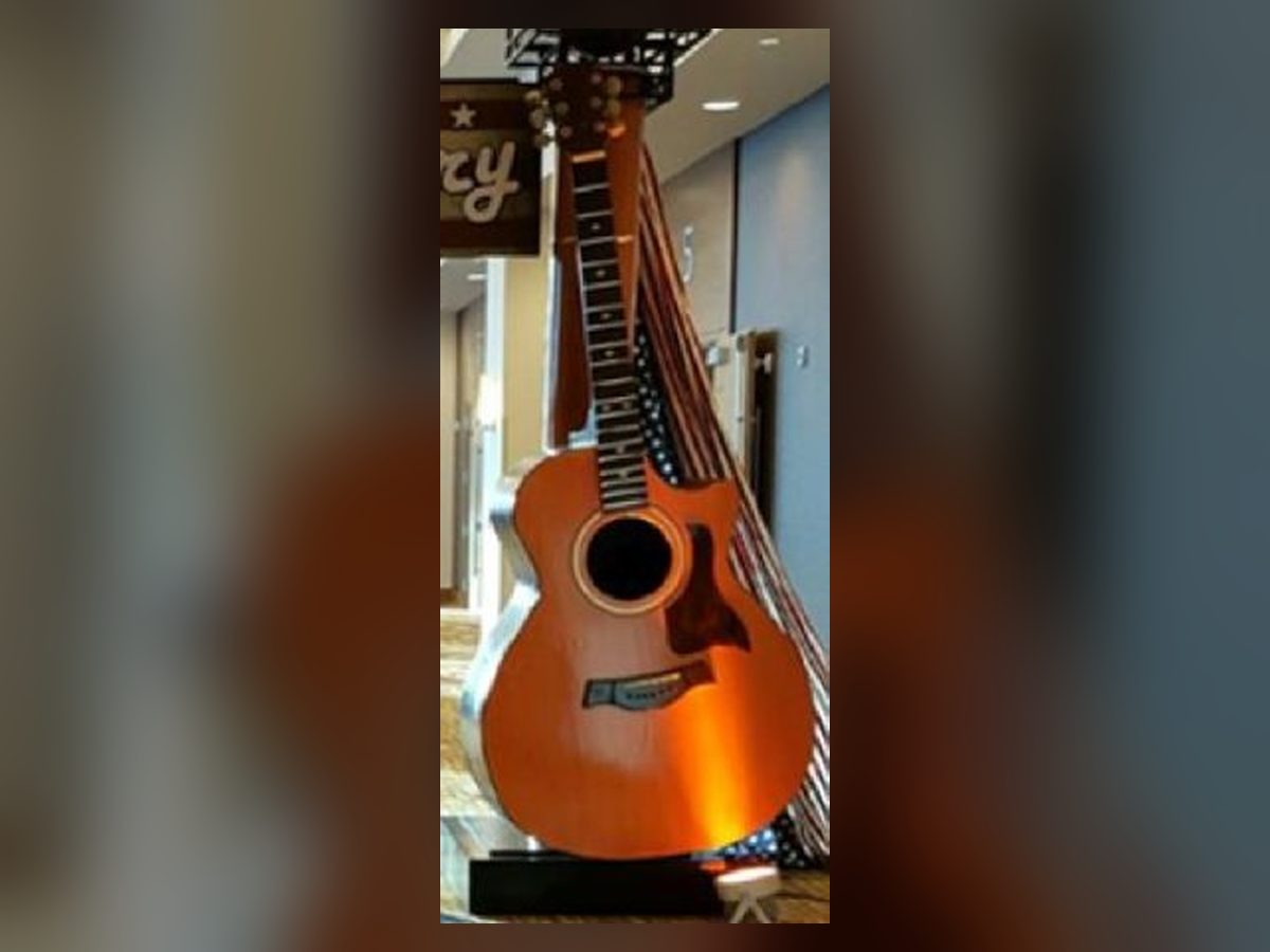 Oversized acoustic guitar prop