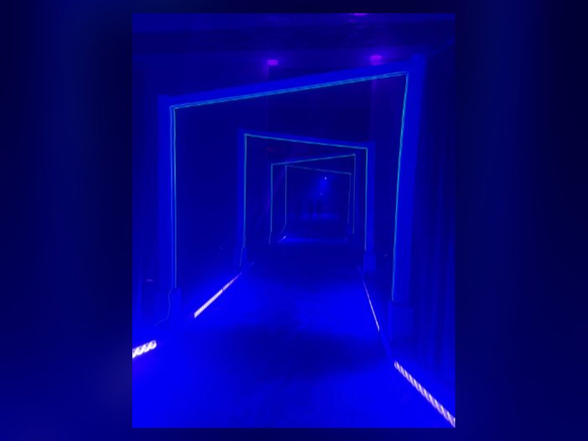 Tunnel of blue LED asymmetrical arches