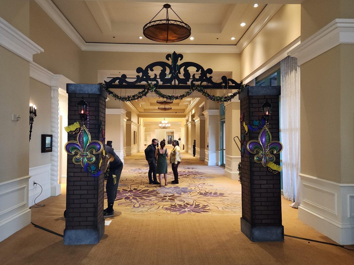 Mardi Gras brick column entry with masks